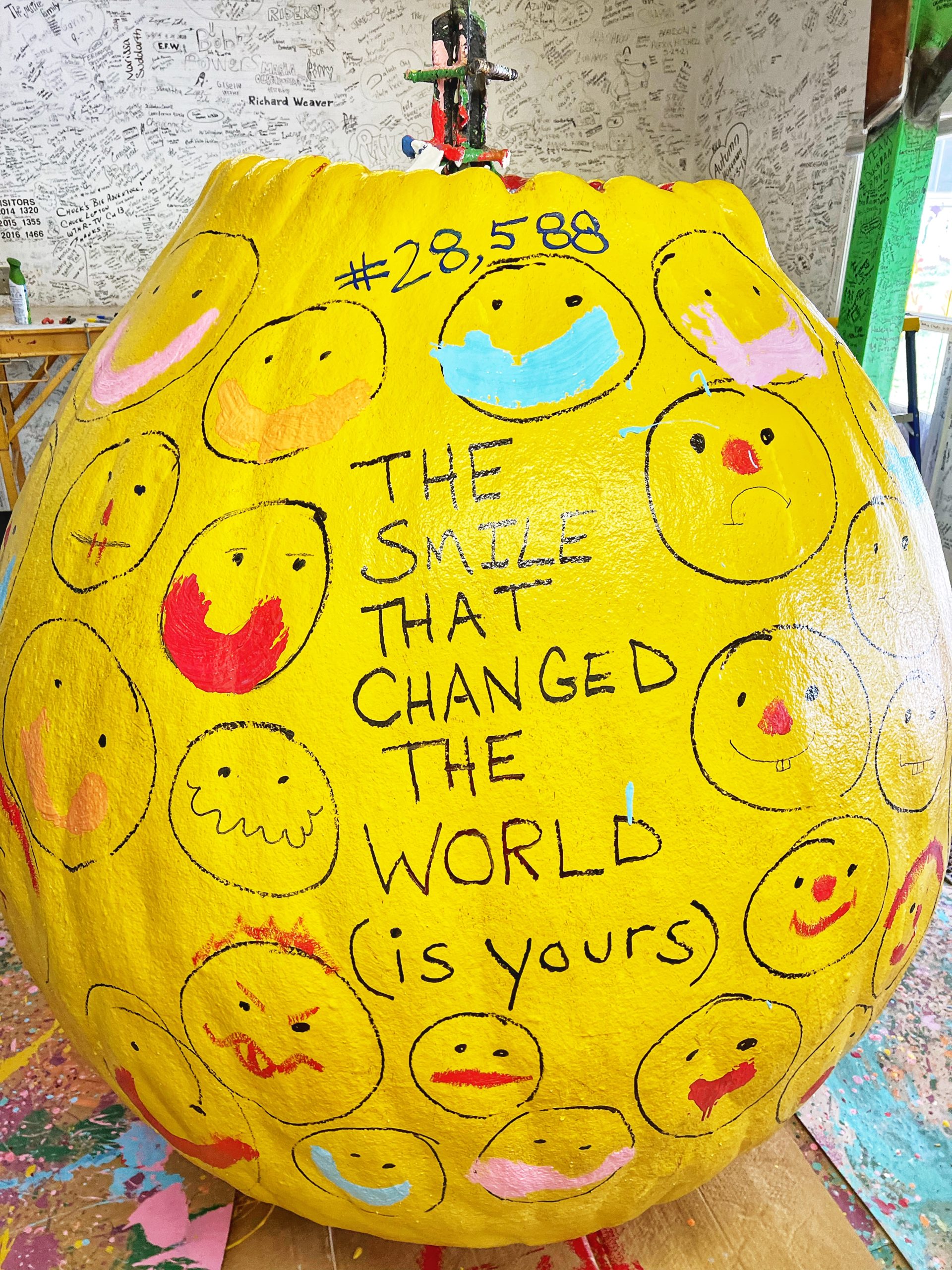 THE SMILE Becomes Part of Roadside Americana History on the “World’s Largest Ball of Paint”